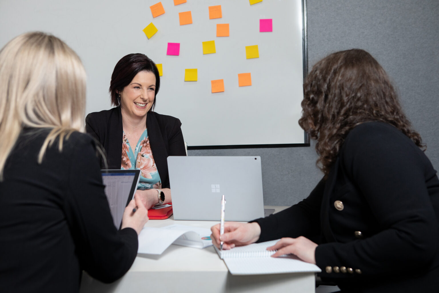 Inspire HQ team members collaborating in their workplace